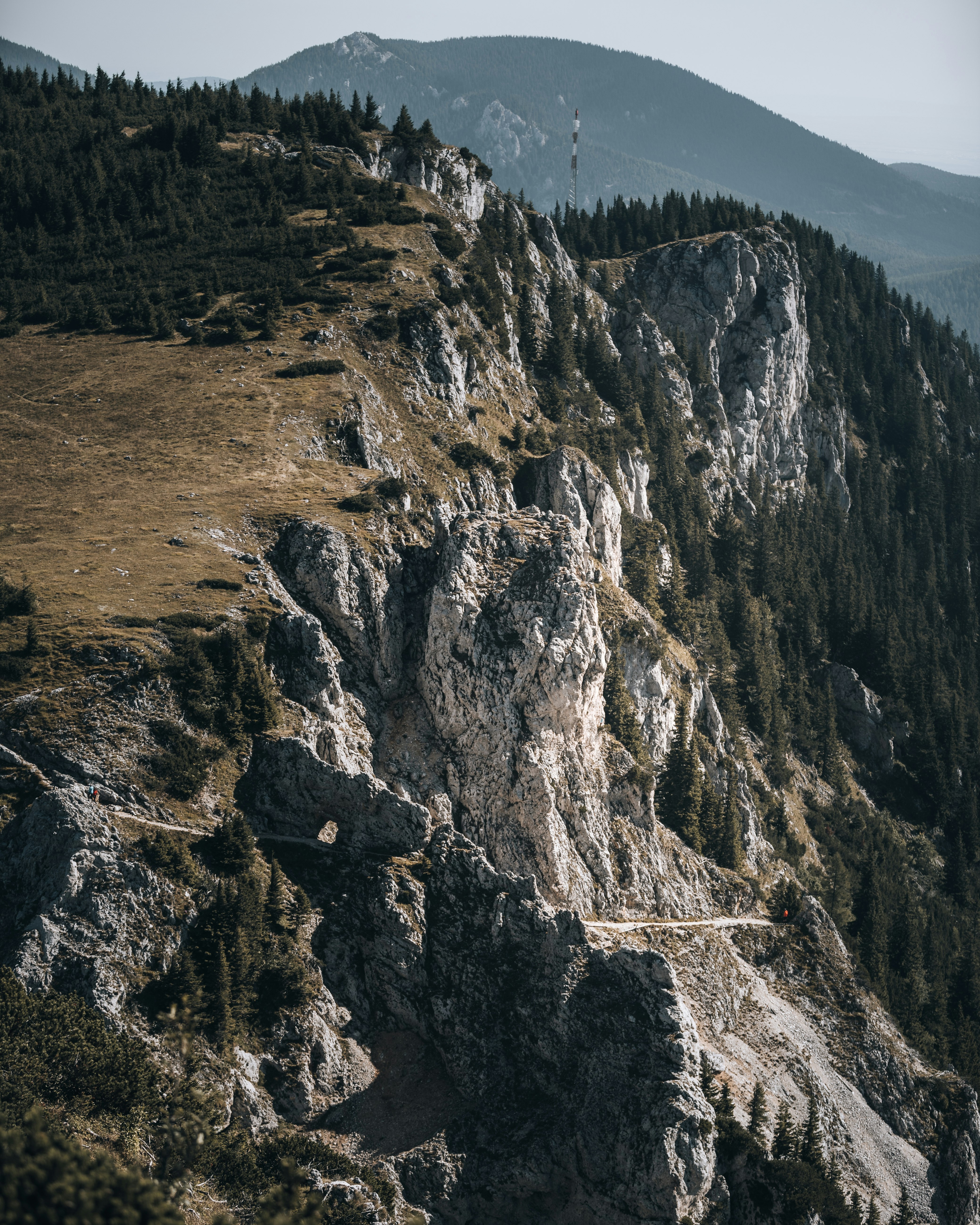 brown rocky mountain under blue sky during daytime